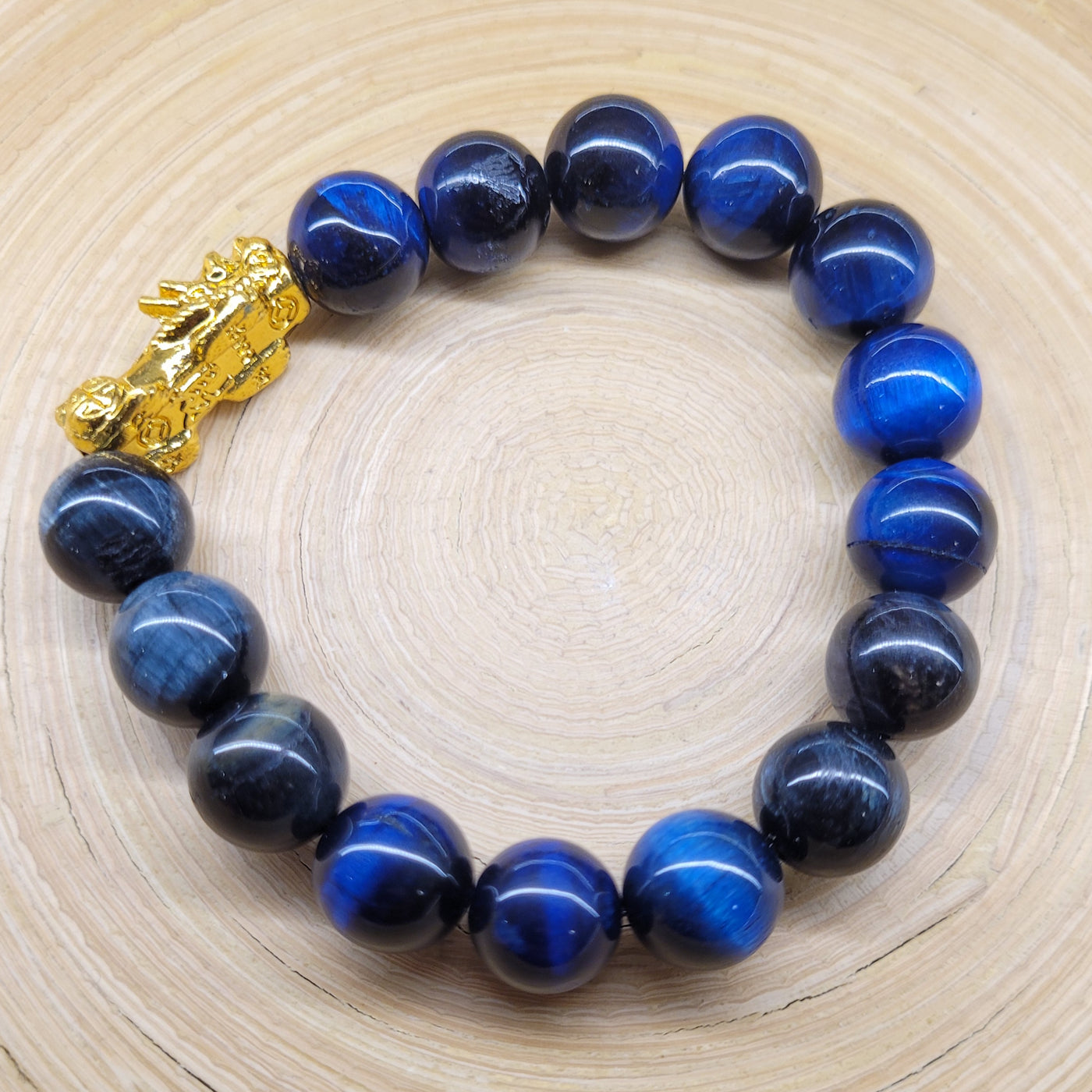 Blue tiger eye with golden charm Bracelet by Designs by Val